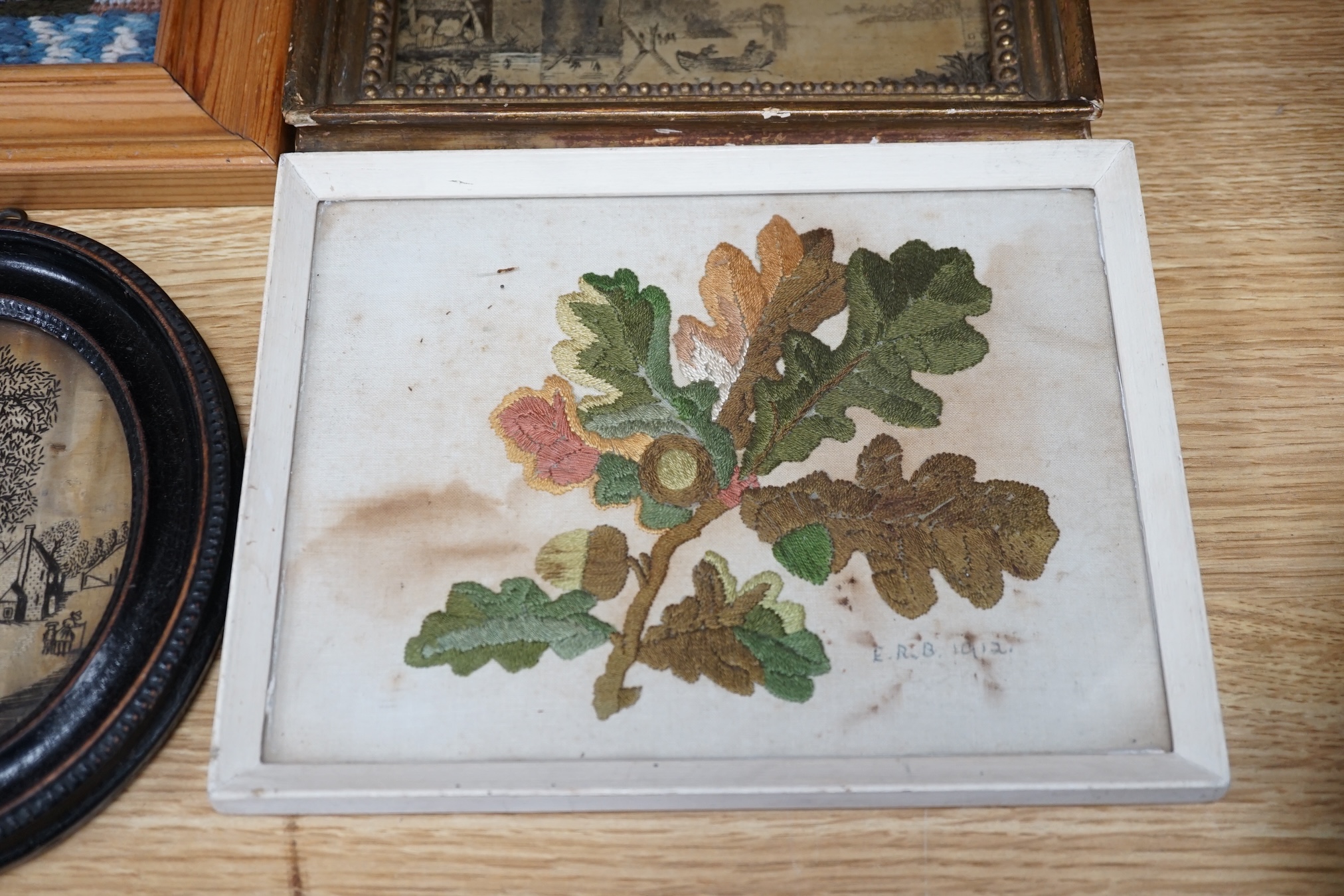 From the Studio of Fred Cuming. Six needlework embroideries including an alphabet sampler, Study of oak leaves, and 19th century landscapes, largest 23 x 29. Condition - varies, poor to fair